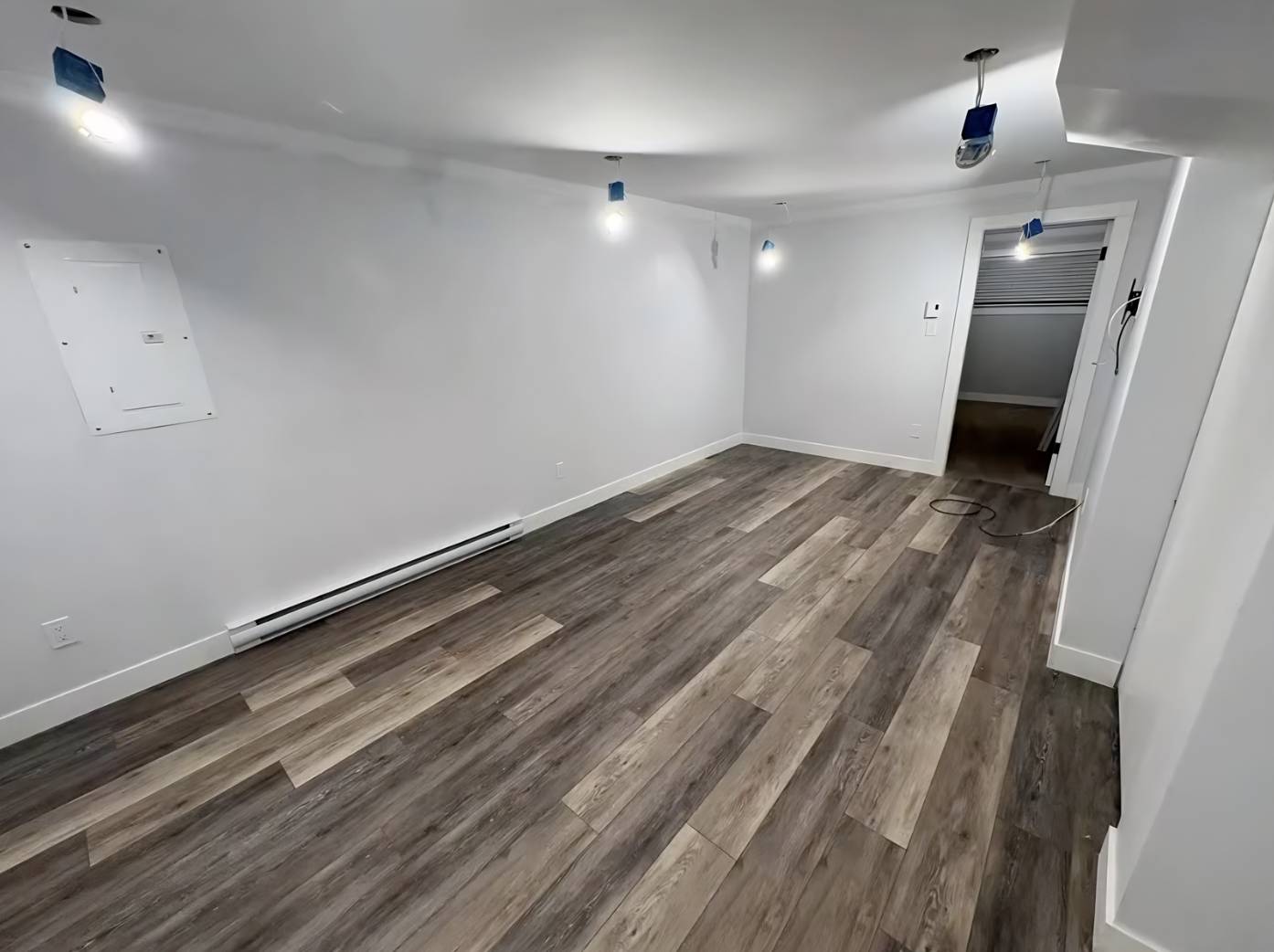 Bright empty room with clean flooring, ready for move-in